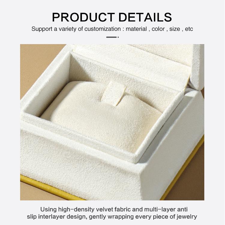 Waist-contoured shape of opulent yellow leather jewelry packaging for high-end brands