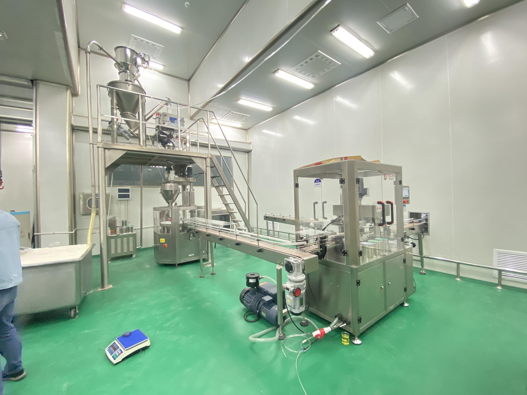  Automatic  powder tin filling machine use for milk powder work in customer site Supplier & manufacturers | Dingjiang 