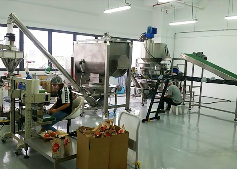 DJ-1B3+50W Automatic vertical stick bag milk coffee powder packing machine customer site 2