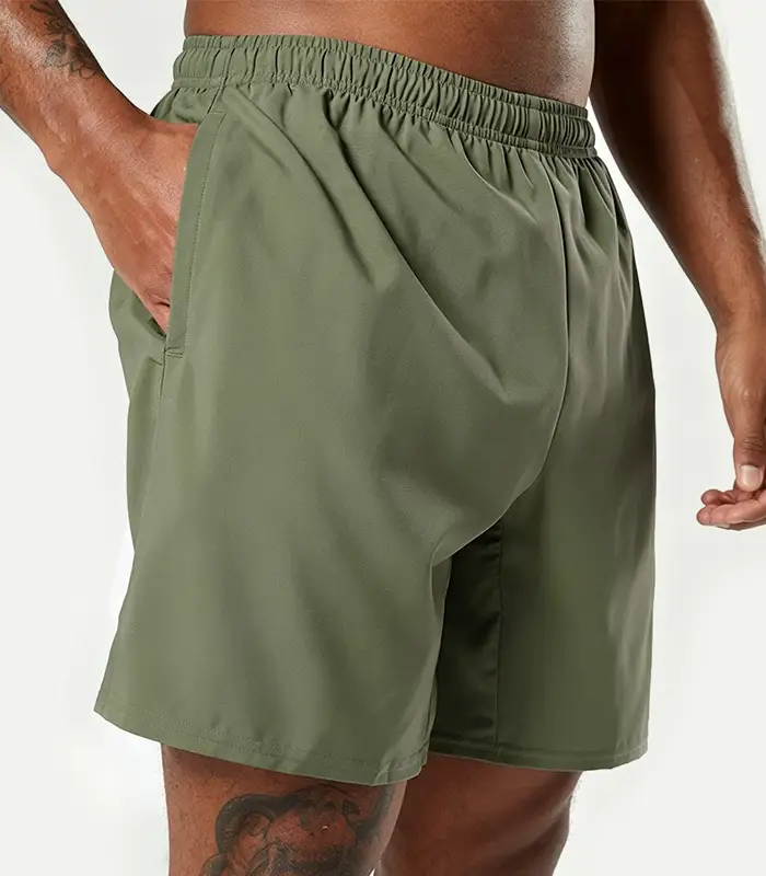 Pantalones cortos deportivos personalizados para hombre, ligeros, de secado rápido, de poliéster, que absorben la humedad, con cintura elástica y cordón ajustable, talla estadounidense. Fabricante de pantalones deportivos: Kangnai Apparel. 1