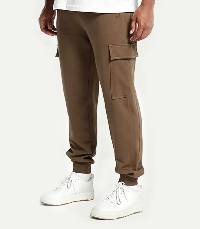 Pantalones cargo deportivos con bolsillo lateral, corte holgado, ideales para días de descanso, con logotipo personalizado, para la temporada de otoño. Fábrica de ropa Kangnai. 1