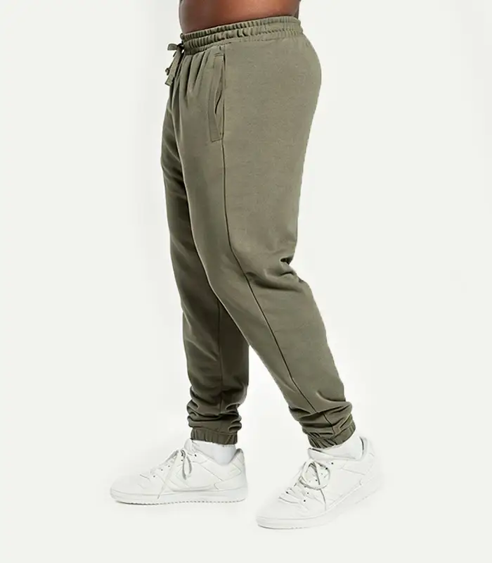 Pantalones deportivos de secado rápido para hombre de marca personalizada, poliéster/algodón, diseño holgado estilo streetwear, cintura elástica, bolsillo oculto, joggers extragrandes. Fabricante: Kangnai. 1