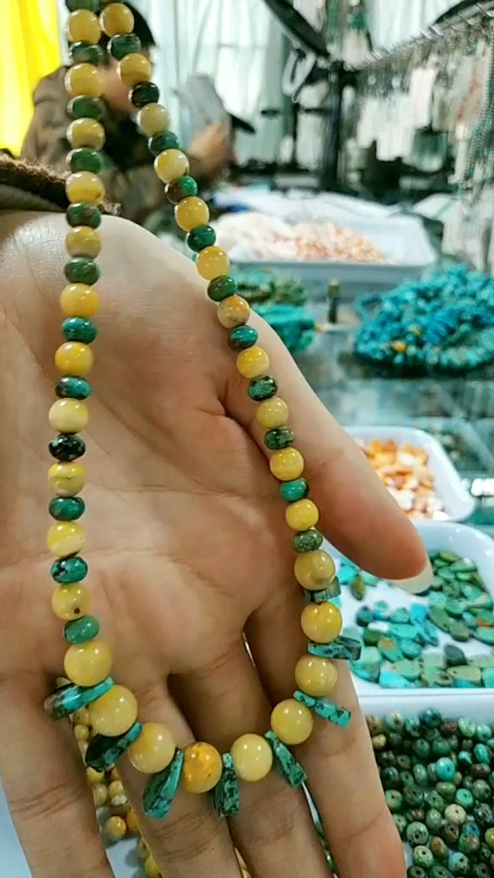 This necklace features bumblebee and turquoise.Unique cornflake shaped turquoise decorative pendant. 9