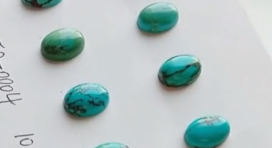 നാച്ചുറൽ ടർക്കോയ്സ് കാബോക്കോൺസ് രത്നങ്ങളുടെ വലിപ്പം 10*14 മിമി 9