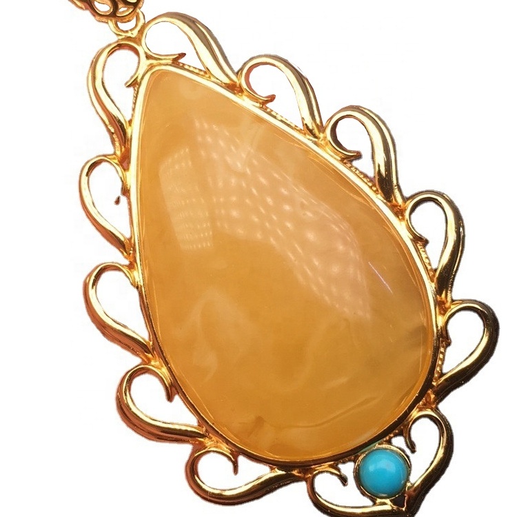 টিয়ারড্রপ-আকৃতি সোনার ধাতুপট্টাবৃত অ্যাম্বার দুল 7