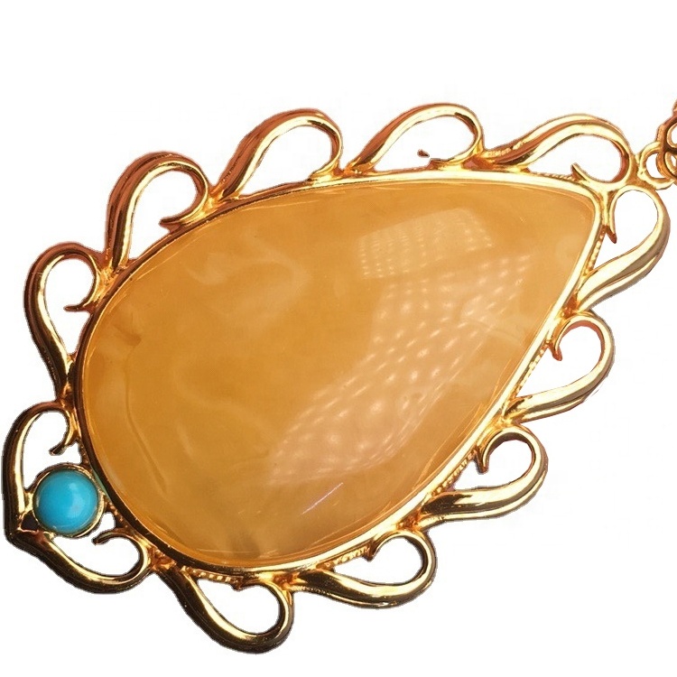 টিয়ারড্রপ-আকৃতি সোনার ধাতুপট্টাবৃত অ্যাম্বার দুল 9