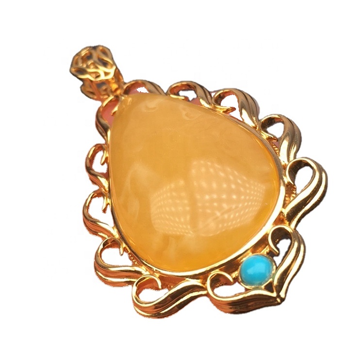 টিয়ারড্রপ-আকৃতি সোনার ধাতুপট্টাবৃত অ্যাম্বার দুল 11