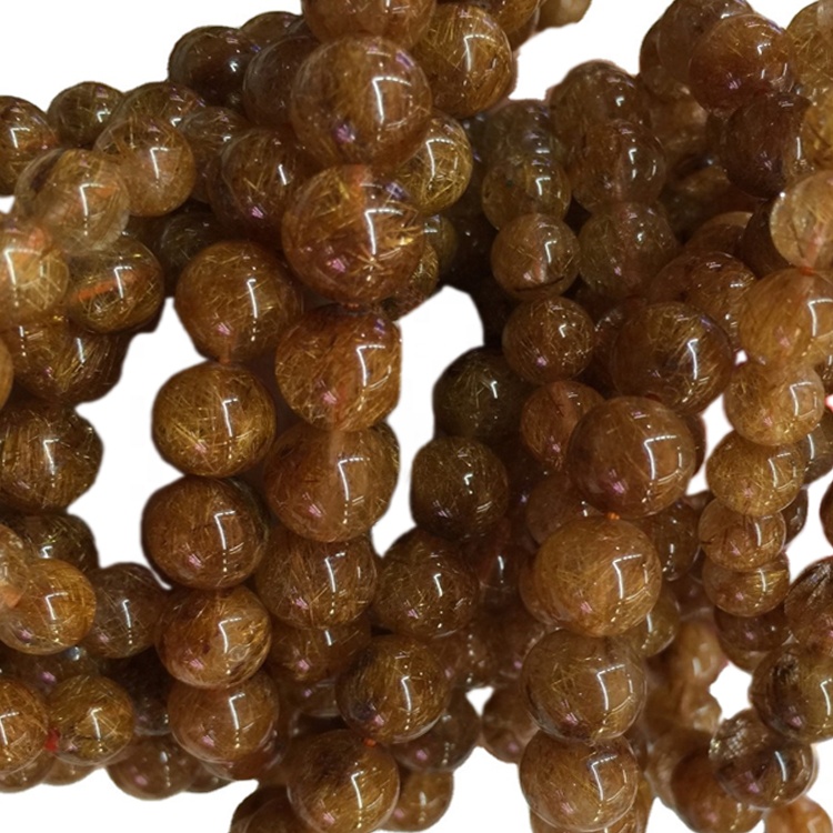 Natuerlike Brazil Koper hierrompere retilearre kwart fan 'e boarst rûne kralen aardich ronde natuerlike kostbere koper rutileare kwartsarmband 11