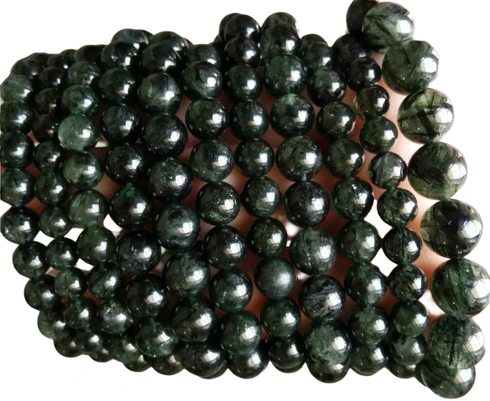 Le perle rotonde scolpite da 23mm fanno il braccialetto della pietra preziosa dei gioielli del quarzo verde rutilato 1