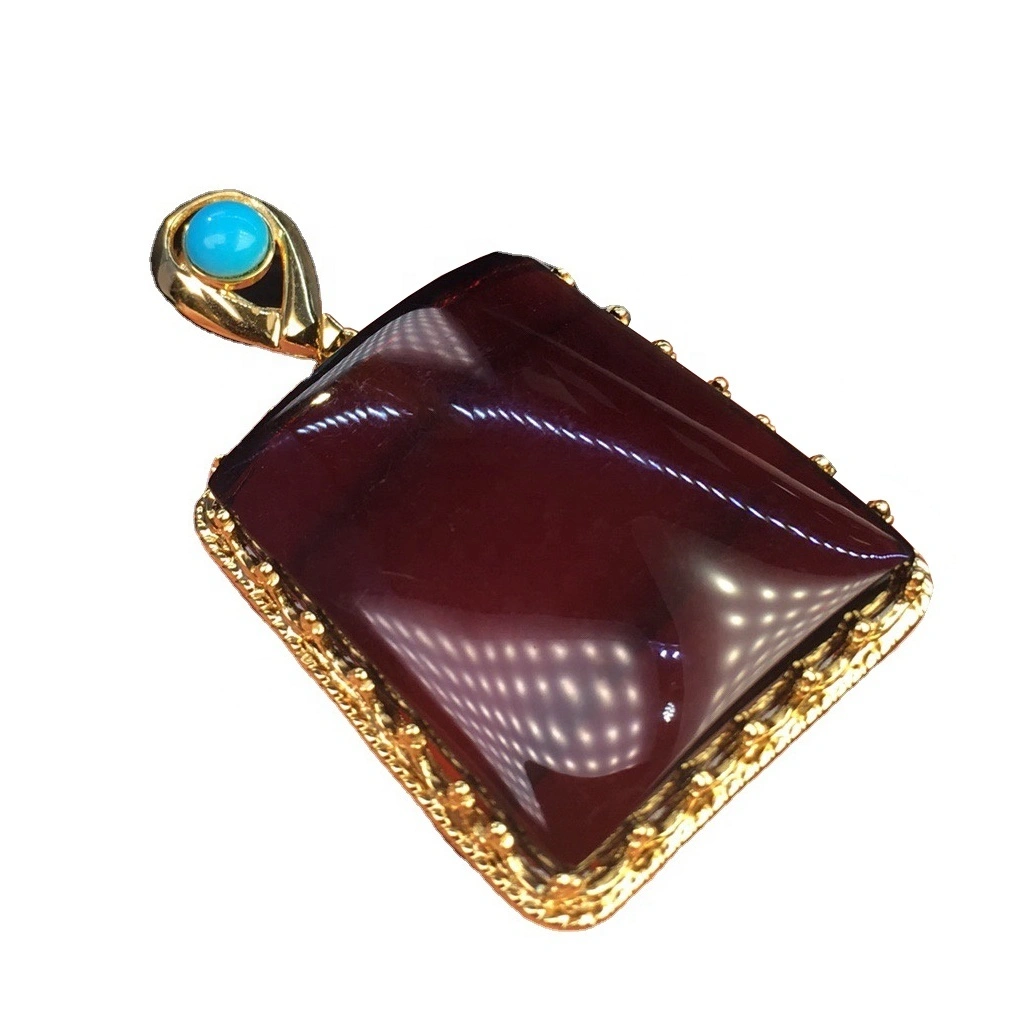 Gold-plated sapiro Black Amber Pendent. 1