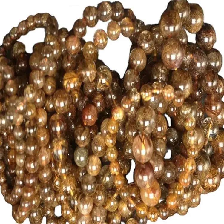 Branelli rotondi del quarzo rutilazione del quarzo del rame naturale del 100% all'ingrosso gioielli di forma rotonda 1