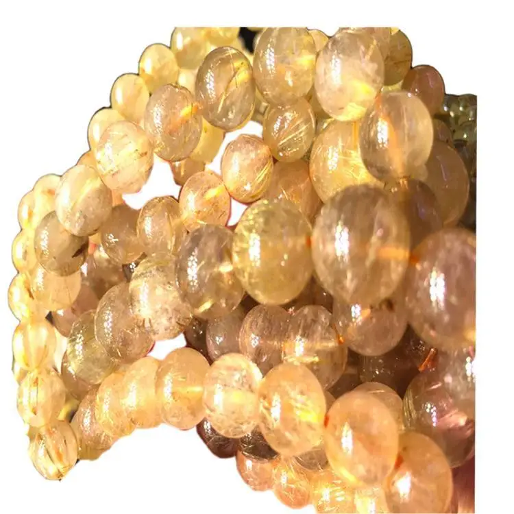 Braccialetto a forma di quarzo rutilato dorato rotondo Braccialetto di pietra naturale Gioielli in pietra unisex 1