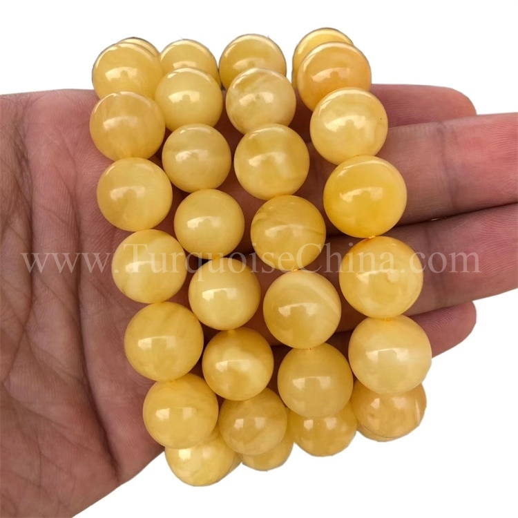 He poro haruru amber ataahua a Amber Conglobate Beads 1