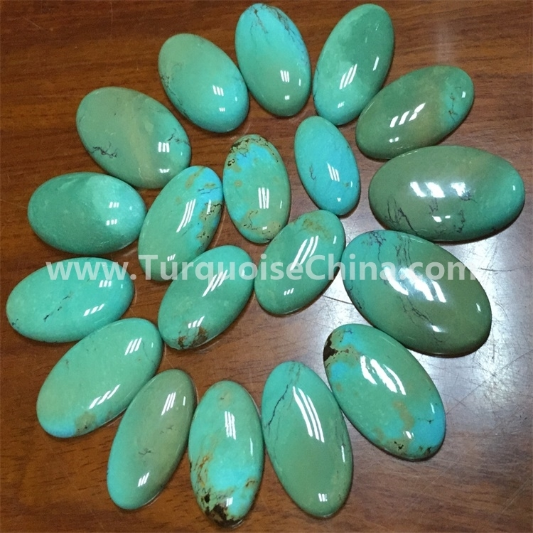 I-Sinkiang turquoise (yendalo) ye-oval cabochon 30x22X7mm 1