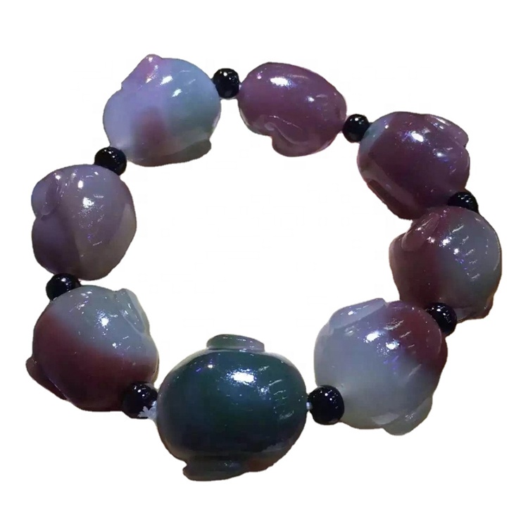 Wofiirira wofiirira wopangidwa ndi ma beads agalu, kukula kosiyanasiyana ndi mawonekedwe omwe alipo 31