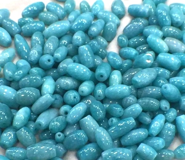 ਐਕਵਾ ਨੀਲੇ ਡਰੱਮ ਮਣਕੇ loose ਿੱਲੇ ਰਤਨ ਨੂੰ ਥੋਕ ਬਣਾਉਂਦੇ ਹਨ 15