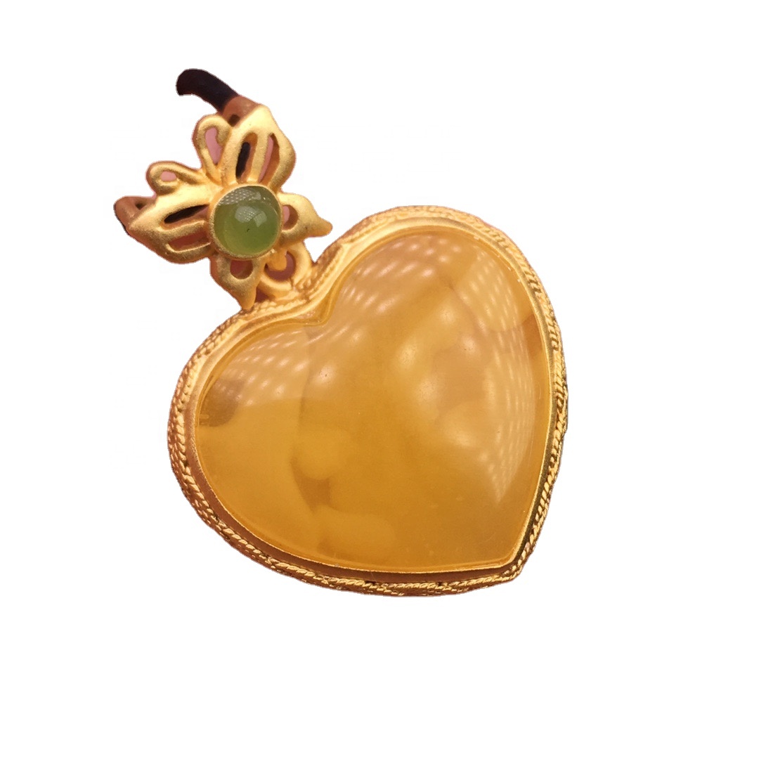 Pendant b'forma ta 'qalb / pendant miksi bid-deheb / żmeraldi pendant ambra 7