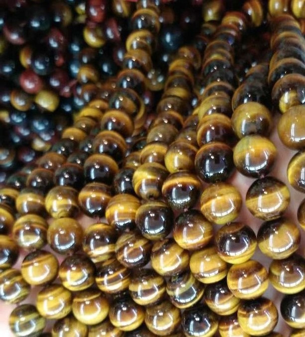 ਕੁਦਰਤੀ ਟਾਈਗਰ ਆਈਡਜ਼ ਗੋਲ ਮਣਕੇ ਉੱਚ-ਗੁਣਵੱਤਾ 3 ਏ ਗਰੇਡ ਦੇ ਰਾਸ਼ੀਅਲ ਗੋਲ ਟਾਈਗਰ ਆਈ ਮਣਕੇ 33