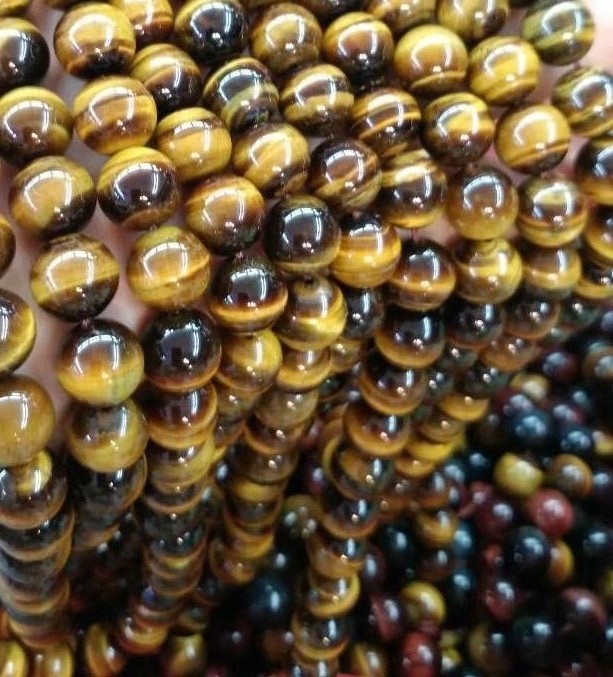 ਕੁਦਰਤੀ ਟਾਈਗਰ ਆਈਡਜ਼ ਗੋਲ ਮਣਕੇ ਉੱਚ-ਗੁਣਵੱਤਾ 3 ਏ ਗਰੇਡ ਦੇ ਰਾਸ਼ੀਅਲ ਗੋਲ ਟਾਈਗਰ ਆਈ ਮਣਕੇ 37