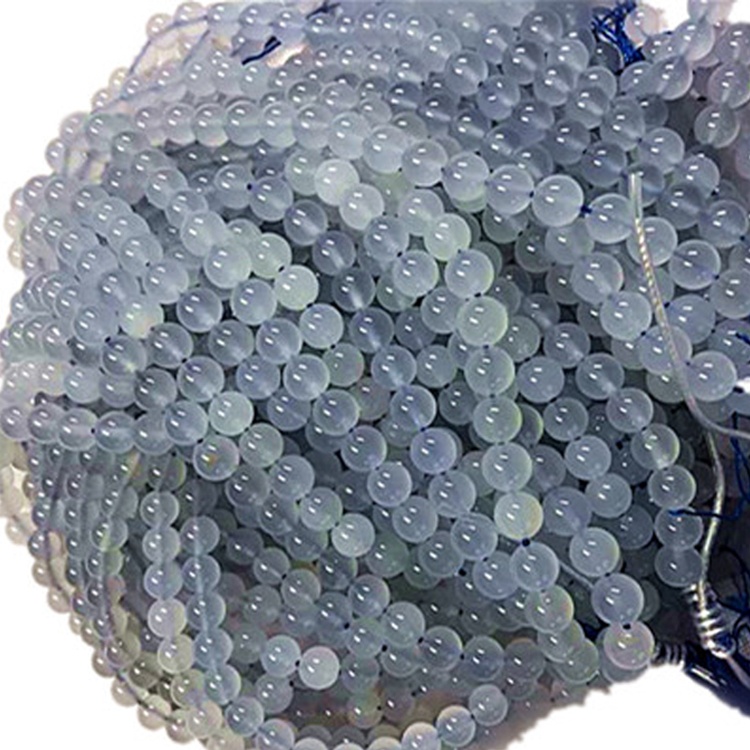 CALCEDONÍA NATURAL FORMA REDONDA CALIENTES DE PISTAS DE PISTONA AZUL 33