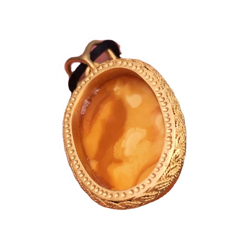 Oval Amber Amber pentrant / dahab ah oo loo yaqaan 'Ruby Peny Pentrant' 38