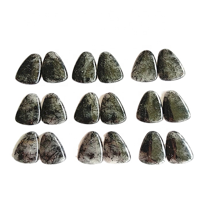 Ko te riihi o te pango maori i te taha maui me te taha matau ki te taha o te Gemstone Sensale me te hokohoko 9