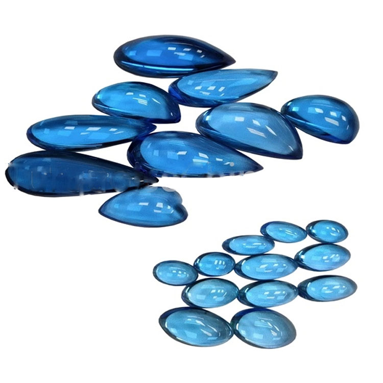 Vakker Swiss Blue Topaz Oval / Pear Shape Cabochon Gemstone 18