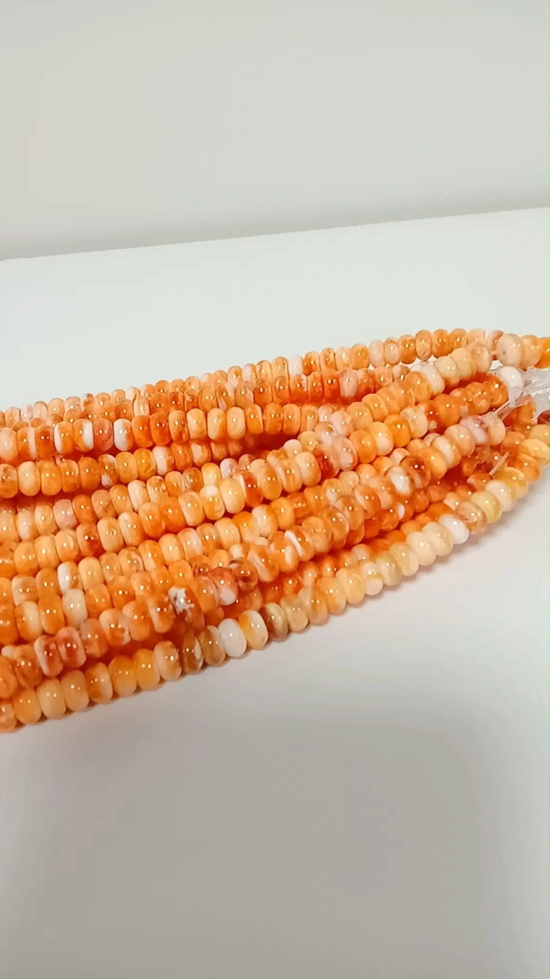 سپینی اویسټر شیل راونډیل موتی د 6mm اندازه 3A کیفیت طبیعي سپینی اویسټر تور نارنجي رنګ 1