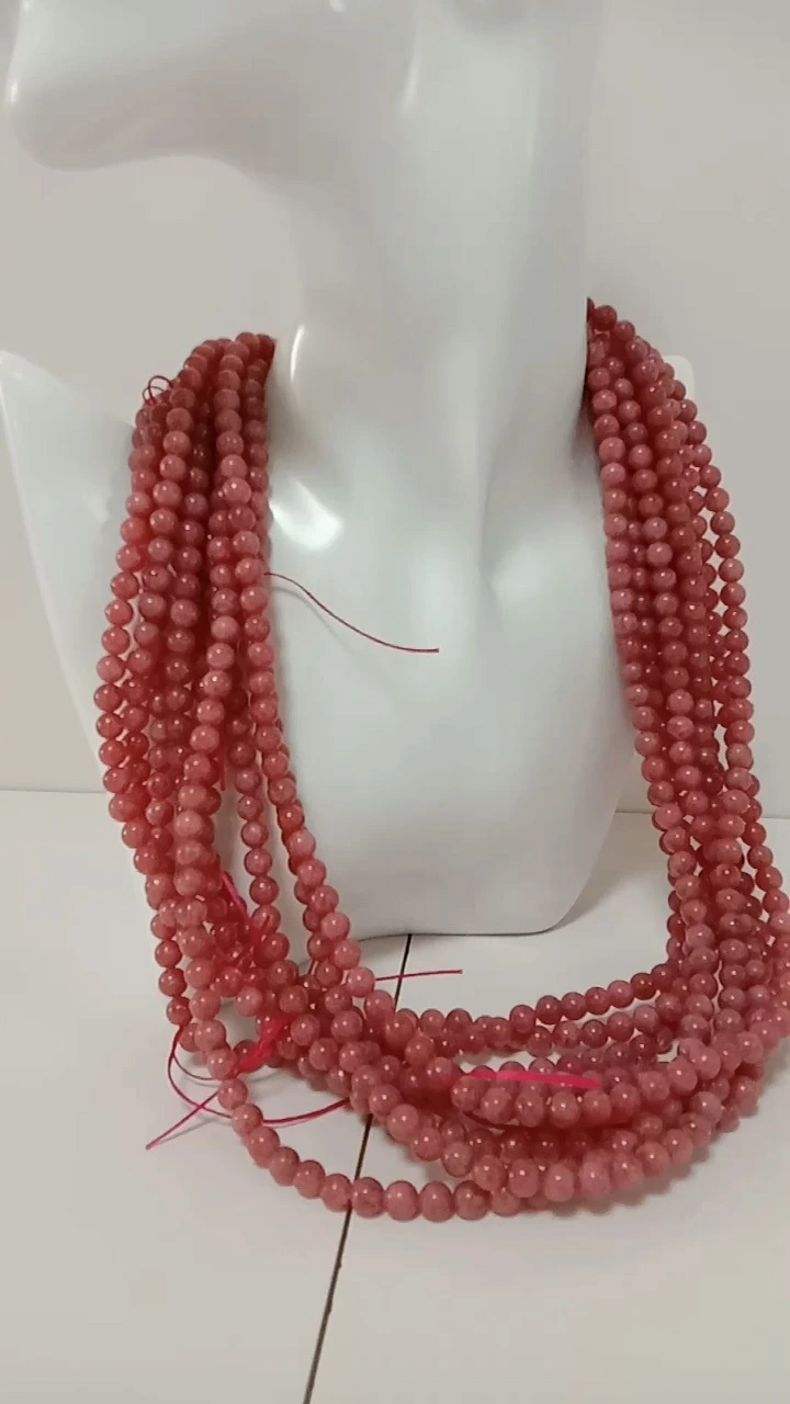 Rhodochrosite-dabiiciga ah ee dhagaxa wareegsan ee miraha Quruxda badan midabka casaanka casaanka ah ee dhabta ah ee tayada fiican leh 1