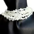 8 * 13mm سپینه کراس د ګاڼو هار او د غوږو سیټ جوړولو لپاره سپینه شیل کراس زړه راښکونکی پینډنټ 1