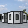 Klein 20 voet uitbreidbare houerhuis Mobiele reissleepwa Container Tiny Home Sleepwaenhuis op sleepwa met wiele onder die huis kampeerhuis 1