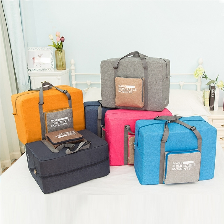 Bolsa dobrável de viagem para armazenamento de roupas, mochila de grande capacidade, versão coreana, bolsa de viagem 1