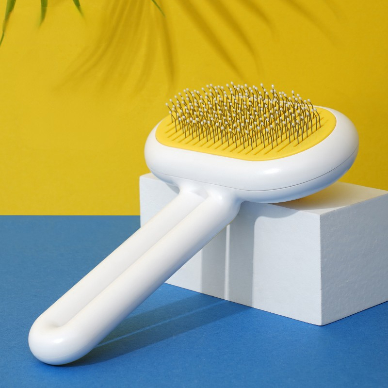 Gele capsulestijl Haarspeldkam voor katten en honden Haarborstel Kattenverzorging Gespecialiseerde kam Kat Hondenverzorging Artefacten Kattenkam voor drijvend haar 1