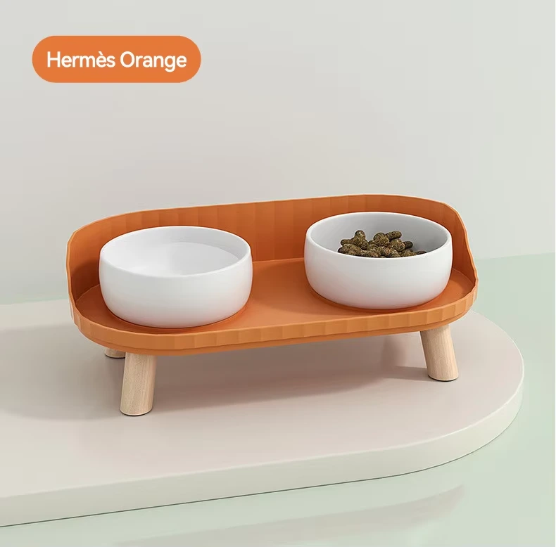 wholesale Cuenco para mascotas para perros con soporte Juego de alimentador de alimentos Cuencos para perros extraíbles lindos Diseño de razas Cerámica antideslizante elevada Naranja sostenible 1