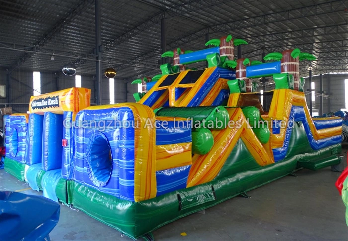 Parque infantil inflable con carrera de obstáculos con tema de jungla y adrenalina 1