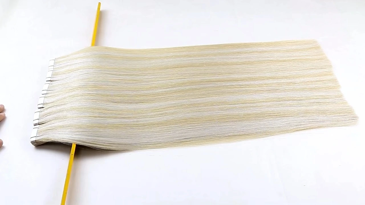Mit Nagelhaut ausgerichtetes Echthaar-Tape in Haarverlängerungen aus reinem Remy-Echthaar 1