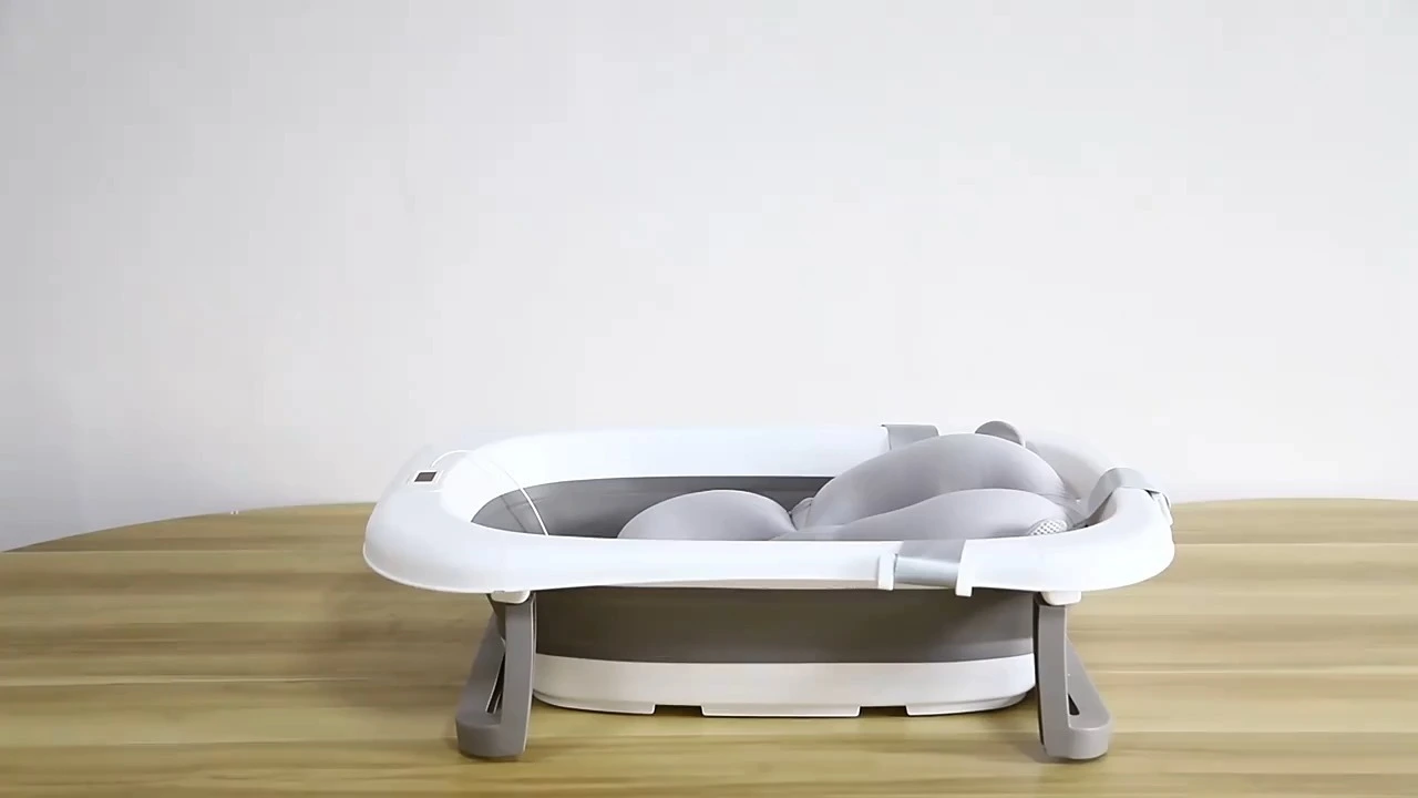 Neugeborenen-Badewanne Doublecare Baby-Kunststoff-Faltbare, günstige, faltbare, tragbare Baby-Badewanne 1