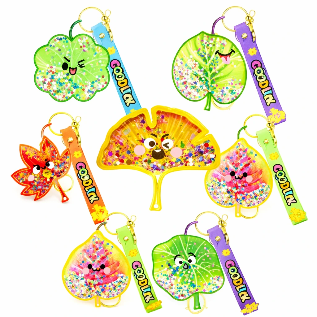 colorful leaf keychain set featuring ginkgo leaf, maple leaf, four leaf clover, lotus leaf and bodhi leaf charms