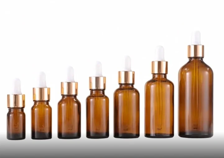 5ML, 10ML, 20ML, 25ML, 30ML, 50ML and 100ML Pink Glass Dropper Bottles with Rose Gold Color Aluminum Lid 1