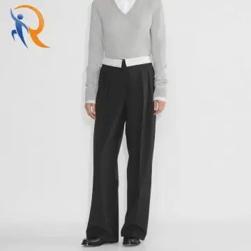 Wool twill mid-rise pleated trousers with fold-over waistband 1