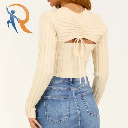 بلوزة قصيرة بأكمام طويلة مضلعة وظهر مفتوح باللون الكريمي 1