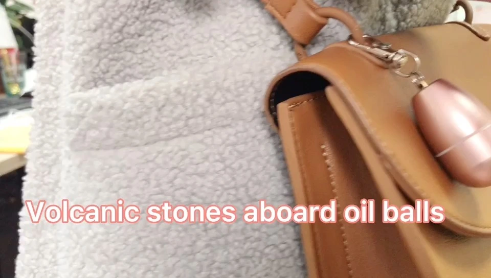 Volcanic stone keychain oil absorbing roller volcanic oil absorbing roller volcanic roller Yingshang custom manufacturer 1