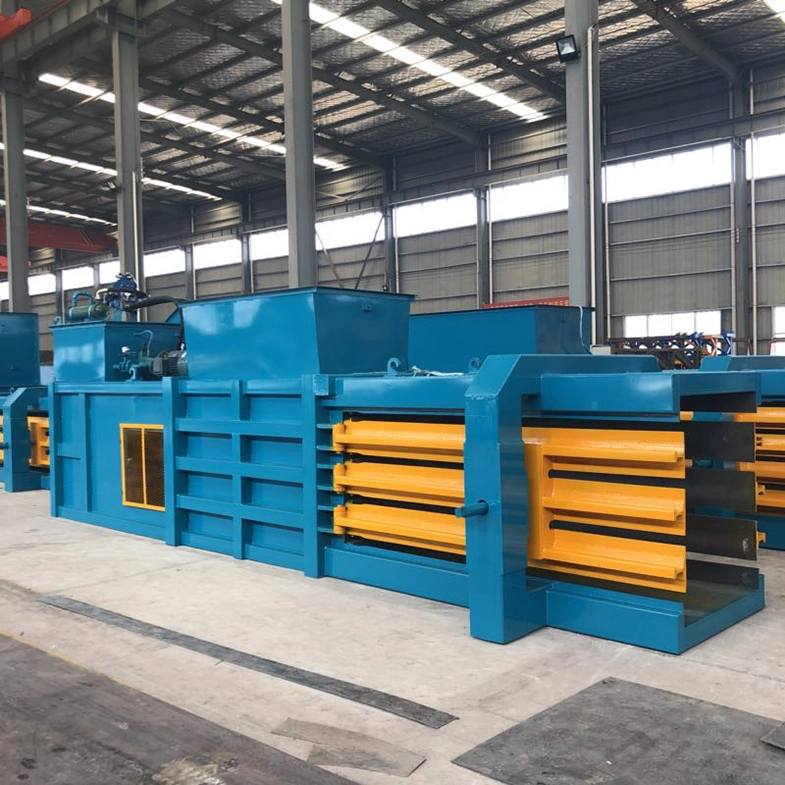 Máquina hidráulica horizontal de prensa compactadora empacadora de cajas de cartón usada 1
