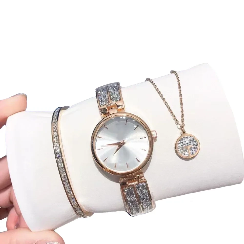 Muestra gratis Cygnet caja de regalo de moda pulsera de acero titanio collar joyería banda de acero reloj de moda de cuarzo 1