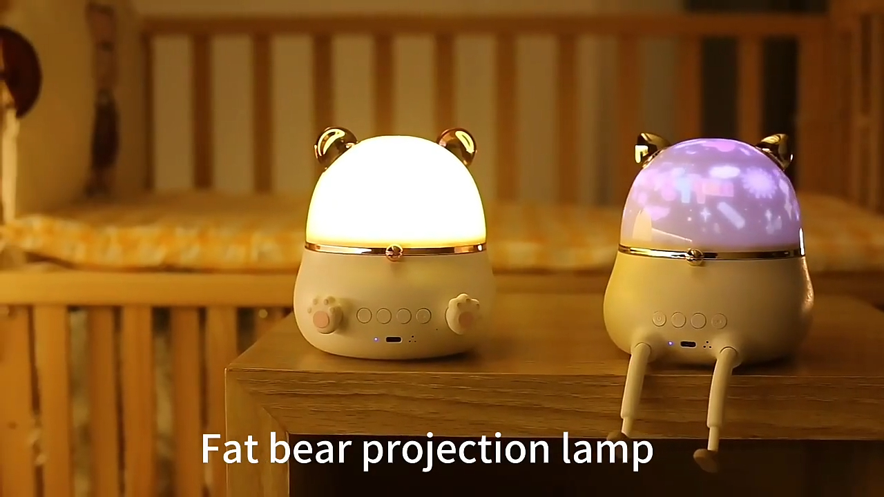 หมีอ้วนหมุนโคมไฟฉาย LED บรรยากาศห้องนอนไฟกลางคืนกล่องดนตรีแบบชาร์จไฟได้รีโมทคอนโทรล 1