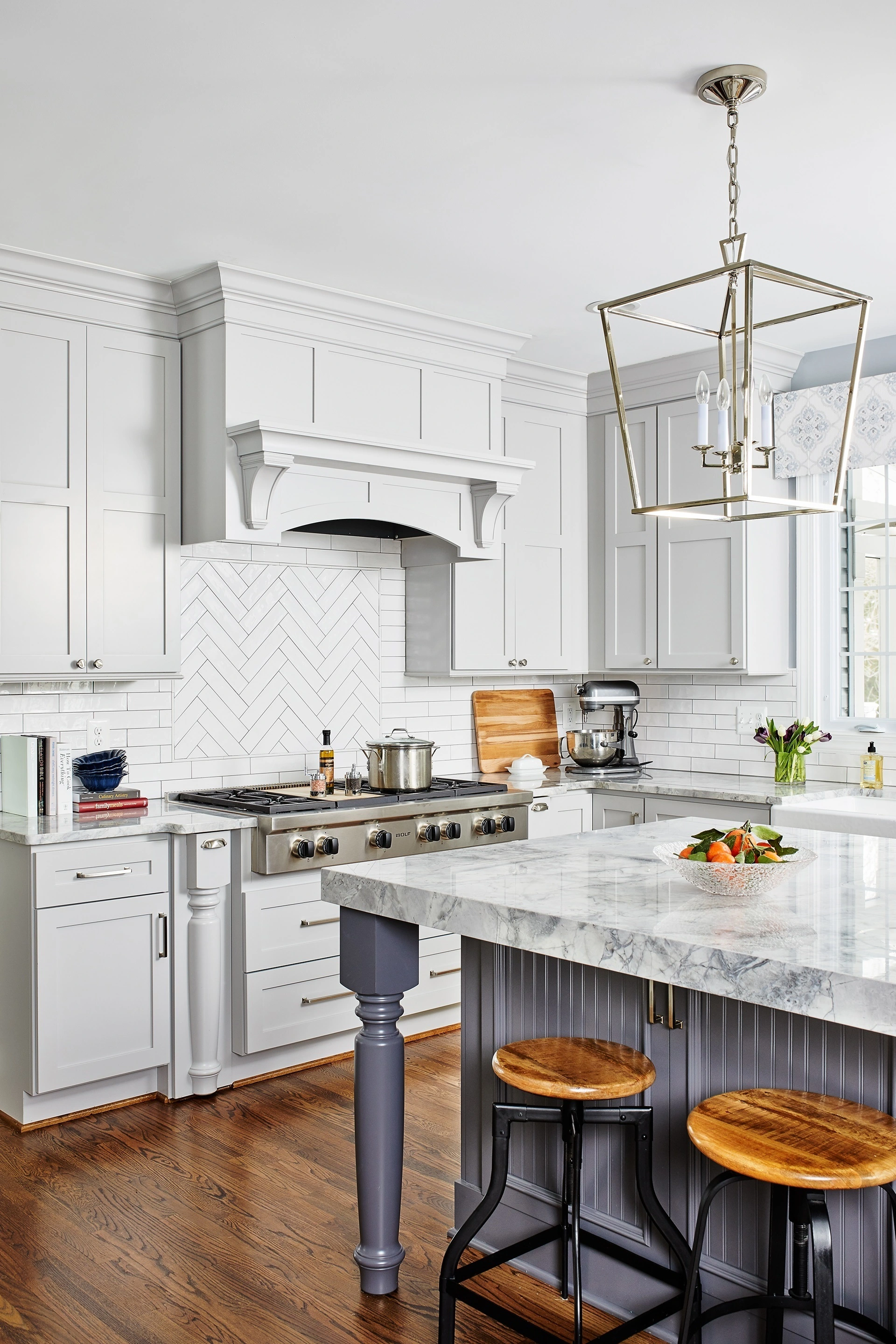 Light grey painted kitchen cabinet with navy blue island transional kitchen-Allandcabinet 1