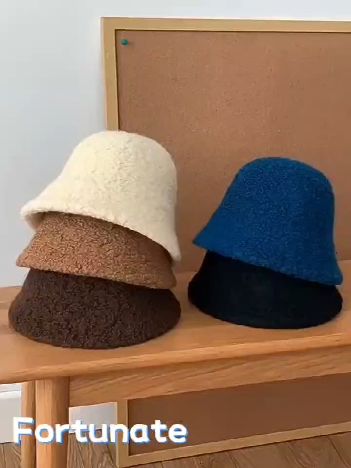 Video cover showing textured bucket hats in cream, tan, dark brown, blue and black on a shelf.