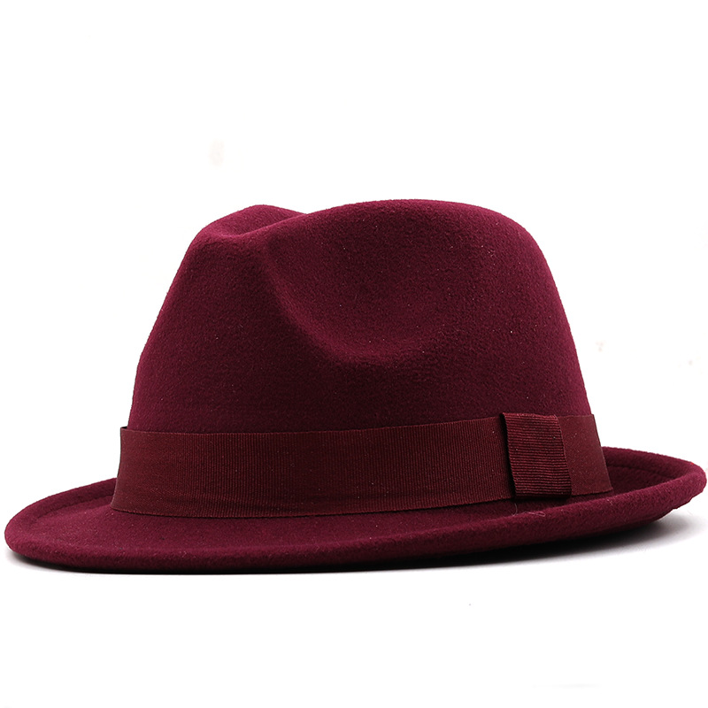Burgundy fedora with a matching ribbon band and pinched crown.