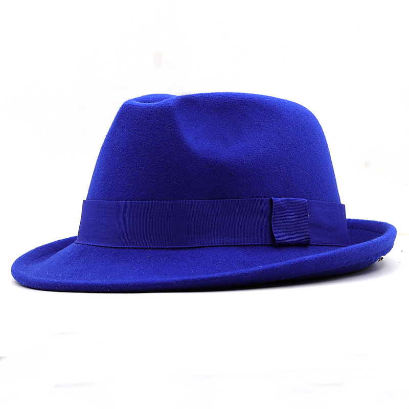 Navy fedora with a black ribbon band and folded side detail.