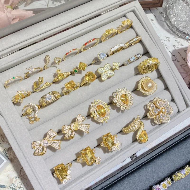 Barato e luxuoso tamanho diferente coleção de anel de diamante amarelo atacado anel de noivado de safira amarela 1